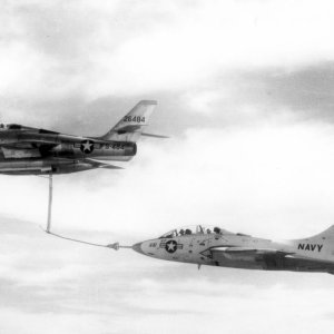 USAF F-84F refueling US Navy F9F-8T