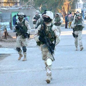 Paratroopers conduct a dismounted patrol in Al Fallujah