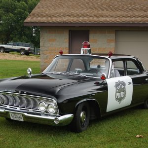 1280px-1961_Dodge_Dart_Seneca_Patrol_Car_(29407608761).jpg