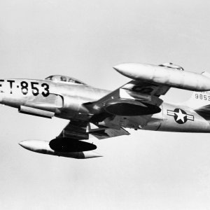 USAF Lockheed F-80C-10-LO Shooting Star S/N 49-853 armed with napalm bombs takes off from a Korean air field.