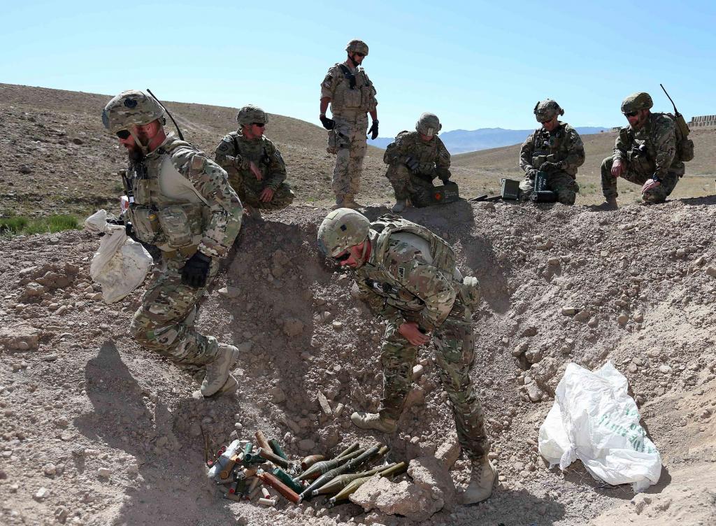 1 Explosive Ordnance Disposal Troop personnel prepare to detonate ordnance on the Multi Nation...jpg