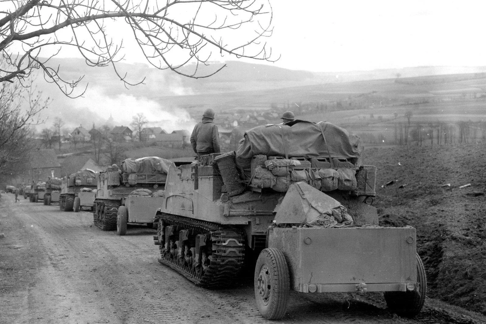 11th Armored Division M7 Priest Column Obernust Germany 1945.webp