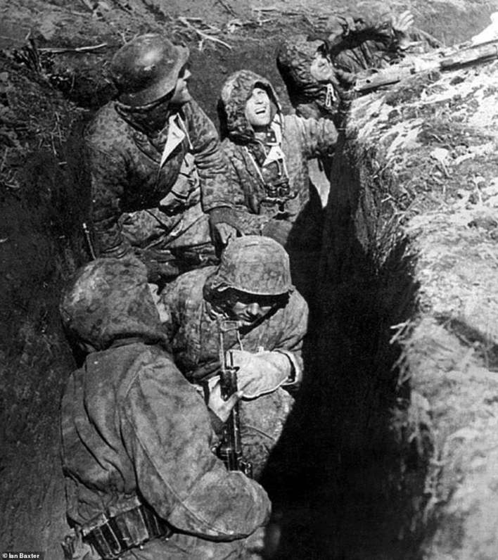 42281730-9516507-Troops_from_the_Waffen_SS_are_seen_above_being_subjected_to_Sovi-m-145_161953...jpg