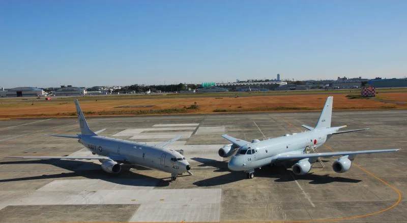 -5_and_Japanese_Kawasaki_P-1_at_NAF_Atsugi_in_2014.webp