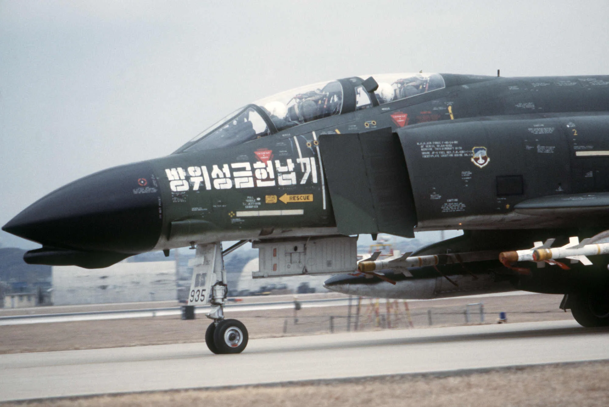 _ROKAF F-4D Phantom II armed with AIM-9 Sidewinder missiles taxis on the flight line in 1979.webp