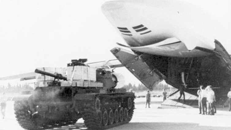 A M60 tank is unloaded from a U.S. Air Force Lockheed C-5A Galaxy in Israel during “Operation ...jpg