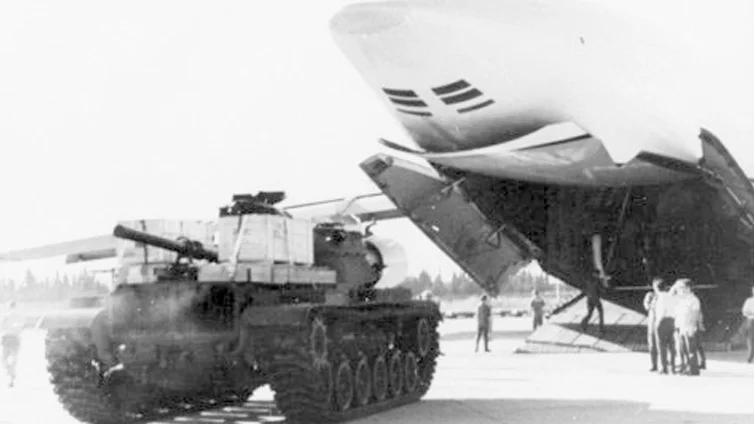 A M60 tank is unloaded from a U.S. Air Force Lockheed C-5A Galaxy in Israel during “Operation...webp