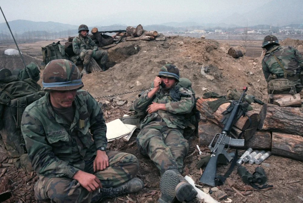 a-soldier-talks-on-a-field-radio-during-the-joint-us-and-south-korean-exercise-a2c7c5-1600.webp