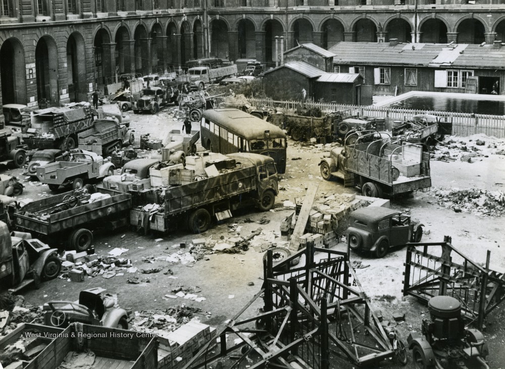 Abandoned German Army vehicles at Paris HQ.jpg