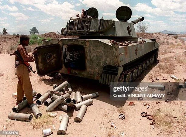 aden-yemen-a-southern-yemeni-soldier-removes-mortar-shells-from-a-tank-17-may-1994-in-the.webp