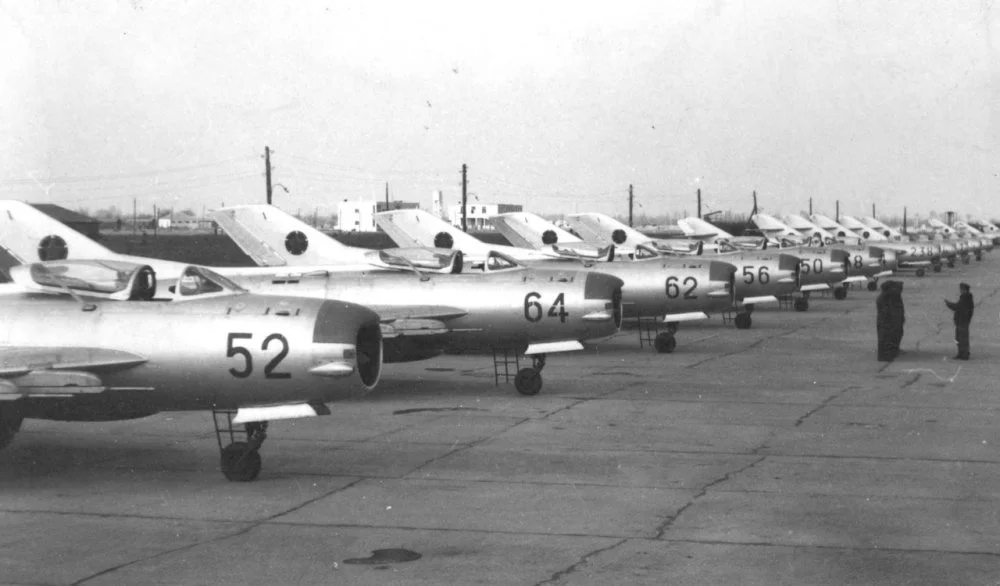 Albanian MiG-19PM (52, 64, 62, 56, 50 .8) & MiG-15bis (238, & more) at Rinas (1959, 65).jpg