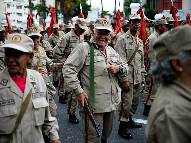 Bolivarian-Militia-march-guns-venezuela-maduro-getty-640x480.webp