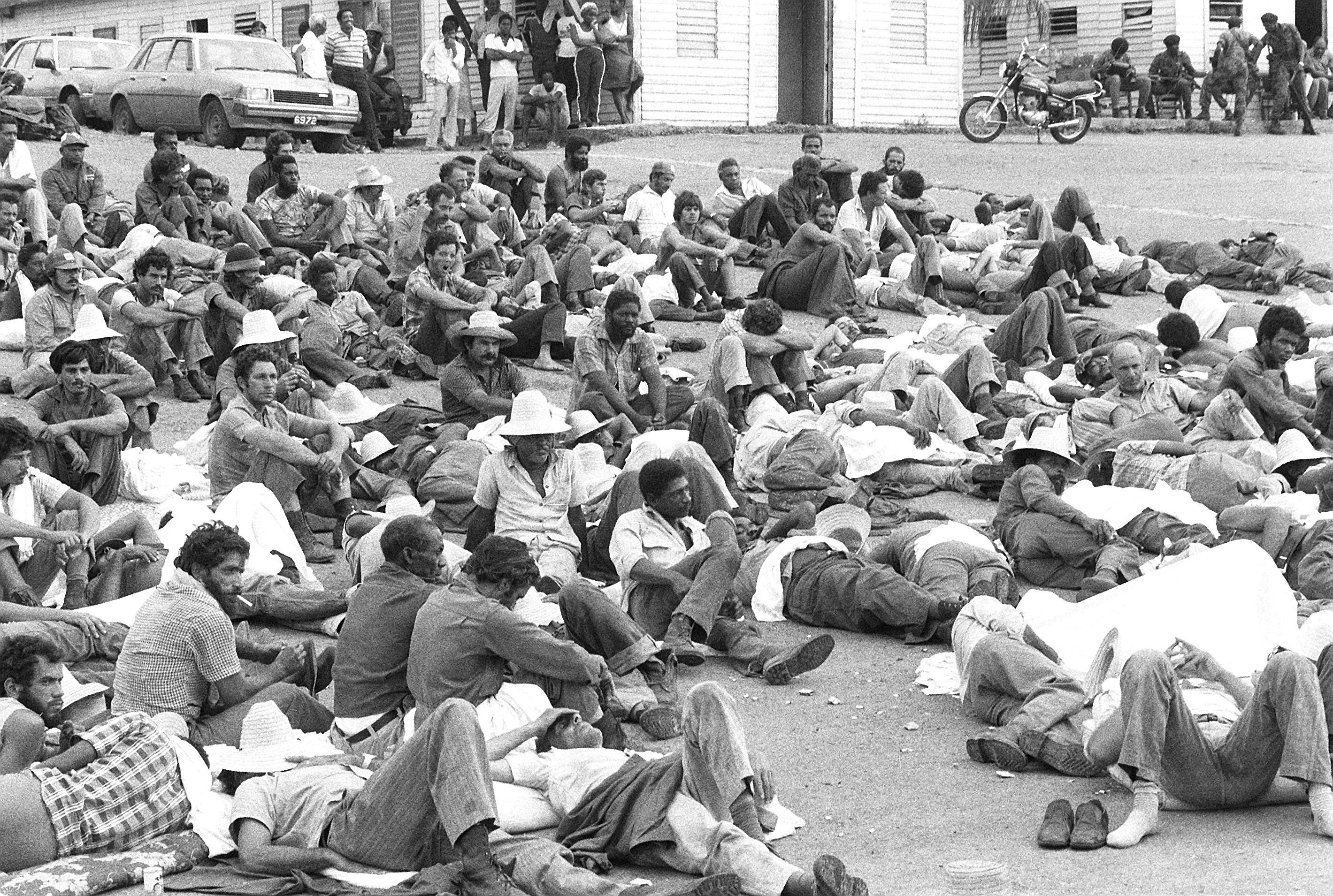 cuban-nationals-sit-in-a-holding-area-awaiting-their-departure-from-the-island-912a47.jpg