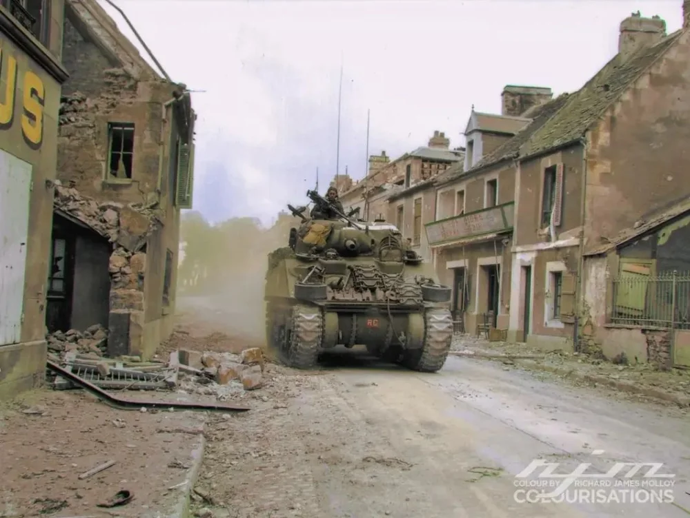 d-Canadian-Armoured-Brigade-advancing-into-Caen-No.webp