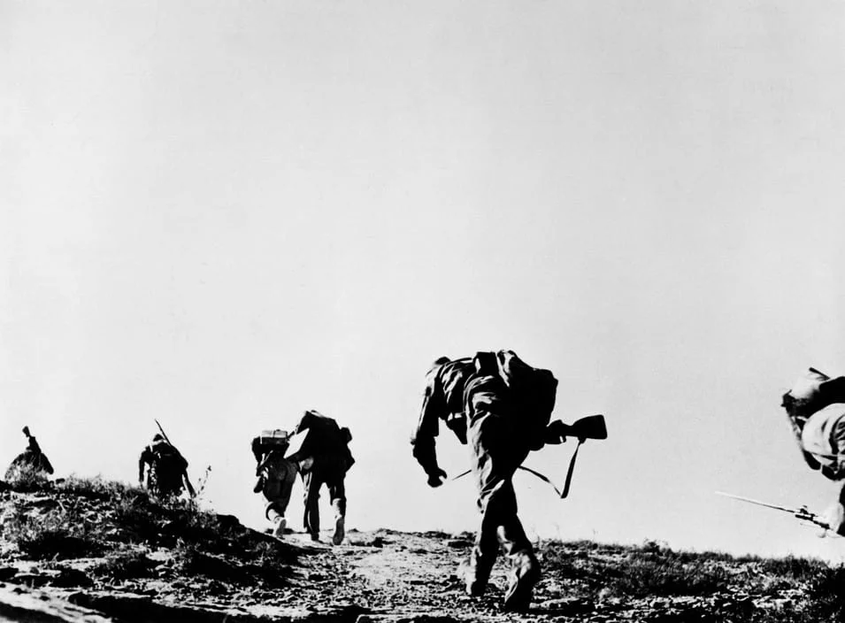 -during-an-offensive-on-the-Rio-Segre.-Robert-Capa.webp