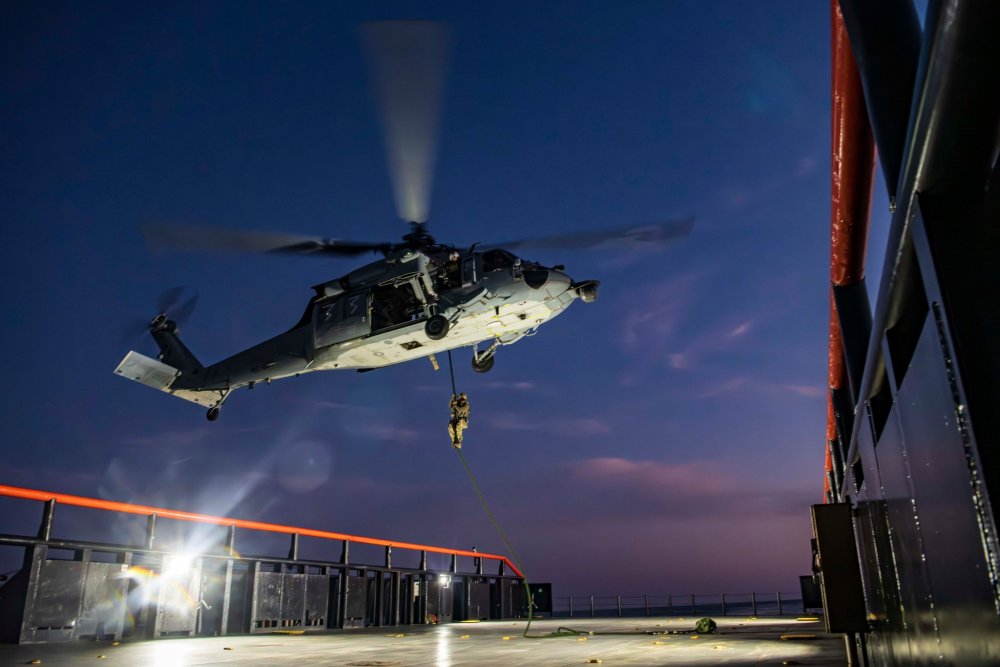 East-coast based Naval Special Warfare Operators (SEAL) fast-rope1.jpg