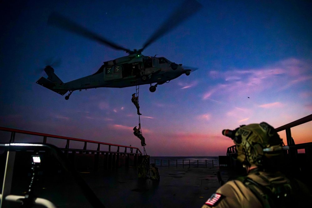 East-coast based Naval Special Warfare Operators (SEAL) fast-rope2.jpg