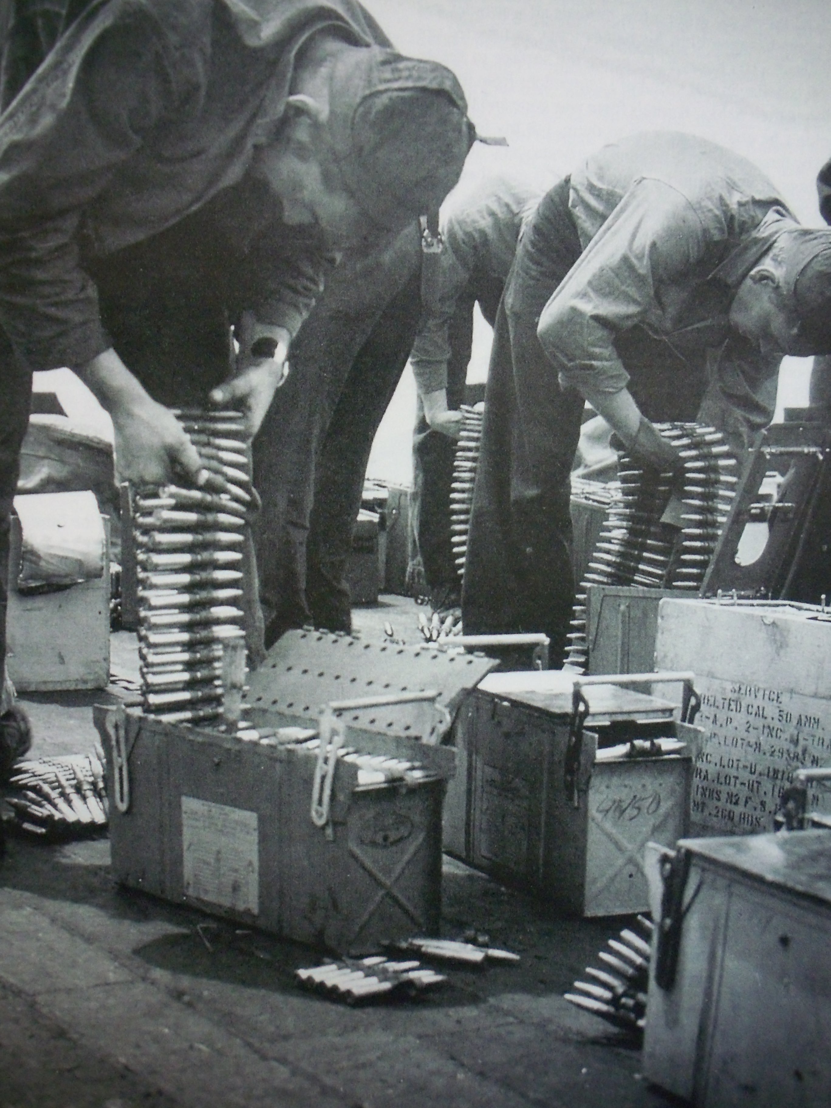 ESSEX CV-9 088 MP Loading aircraft magazines with 50 caliber ammo for planes WWII.JPG
