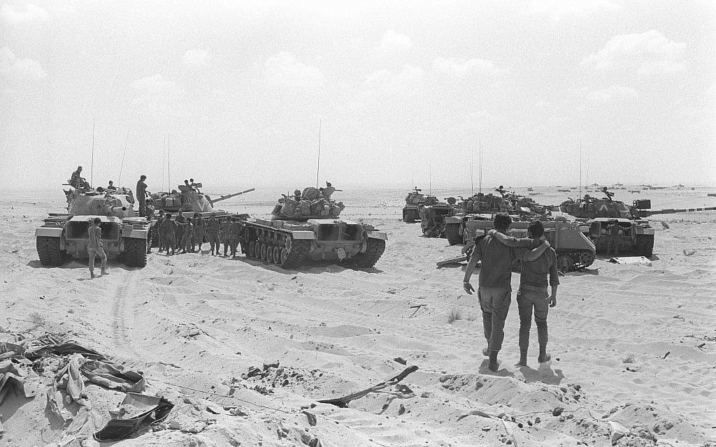 Israeli armored vehicles take positions during the start of the Yom Kippur War on October 10, ...jpg