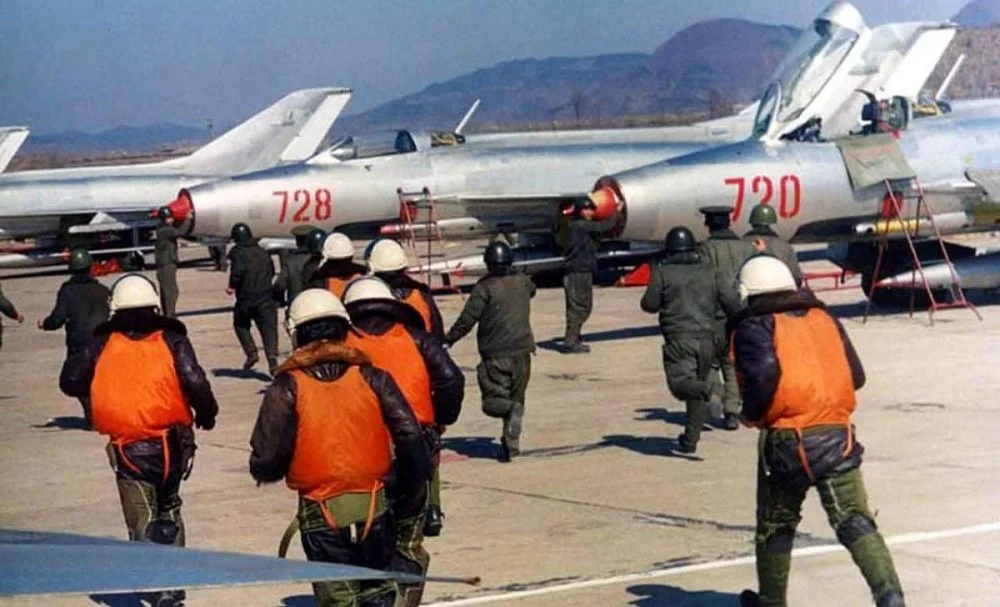 KPAF J-7I (728 & 720 red) on ground.jpg