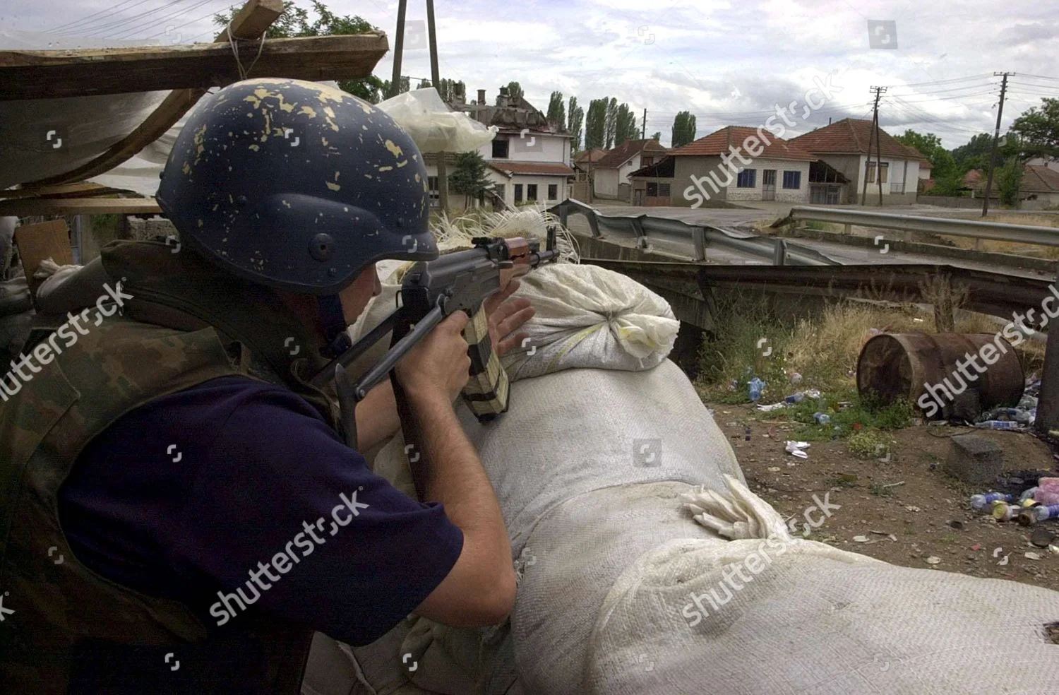 macedonia-police-check-point-jun-2001-shutterstock-editorial-7731505d.webp