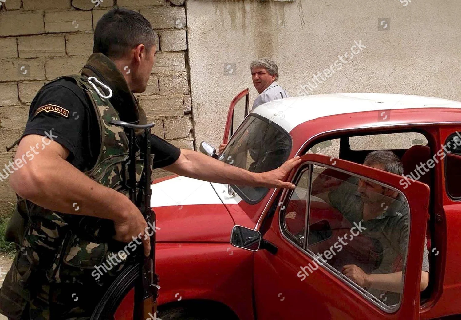 macedonia-policeman-check-may-2001-shutterstock-editorial-7723245a.webp