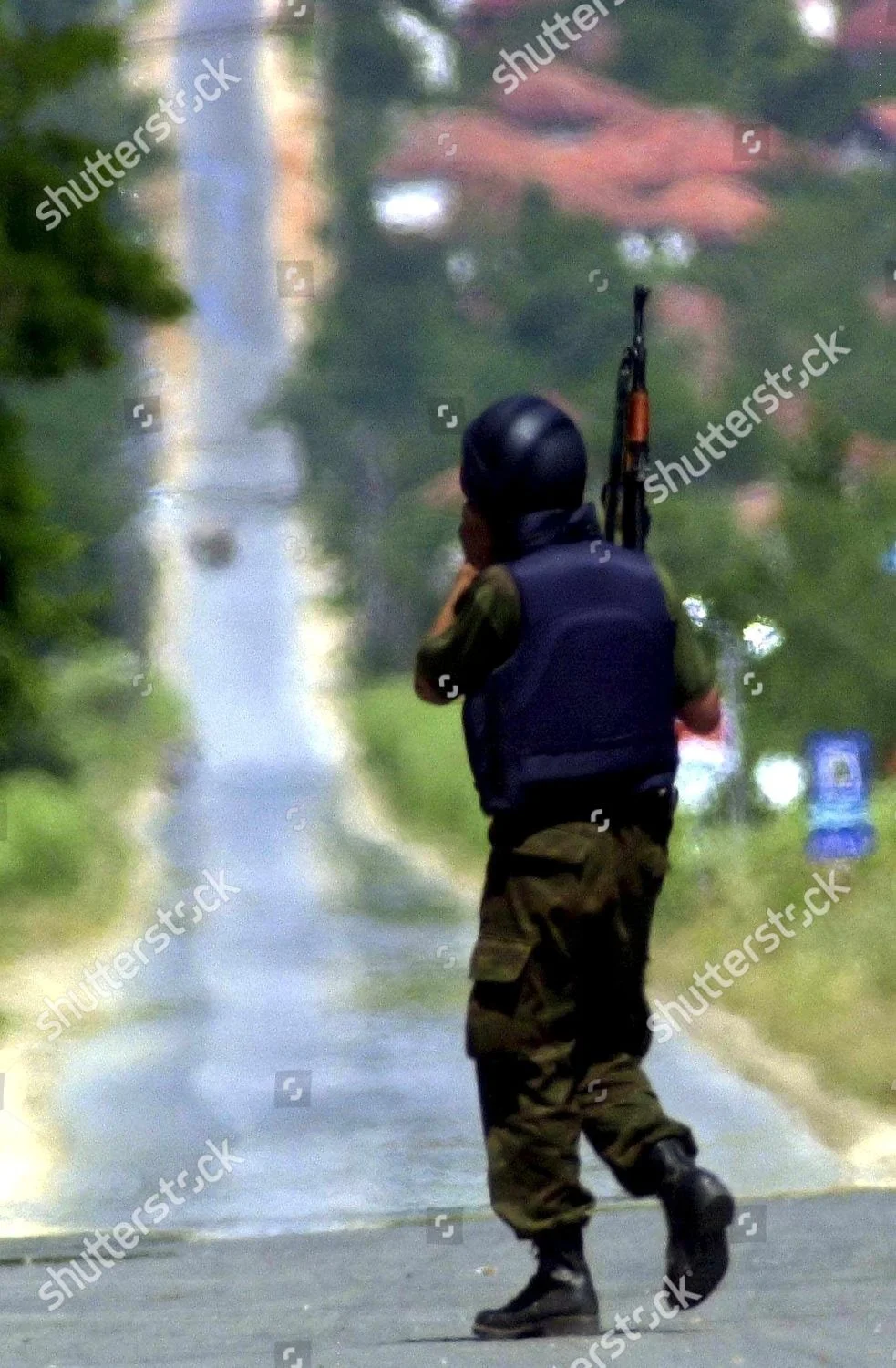 macedonia-policeman-jun-2001-shutterstock-editorial-8482153a.webp