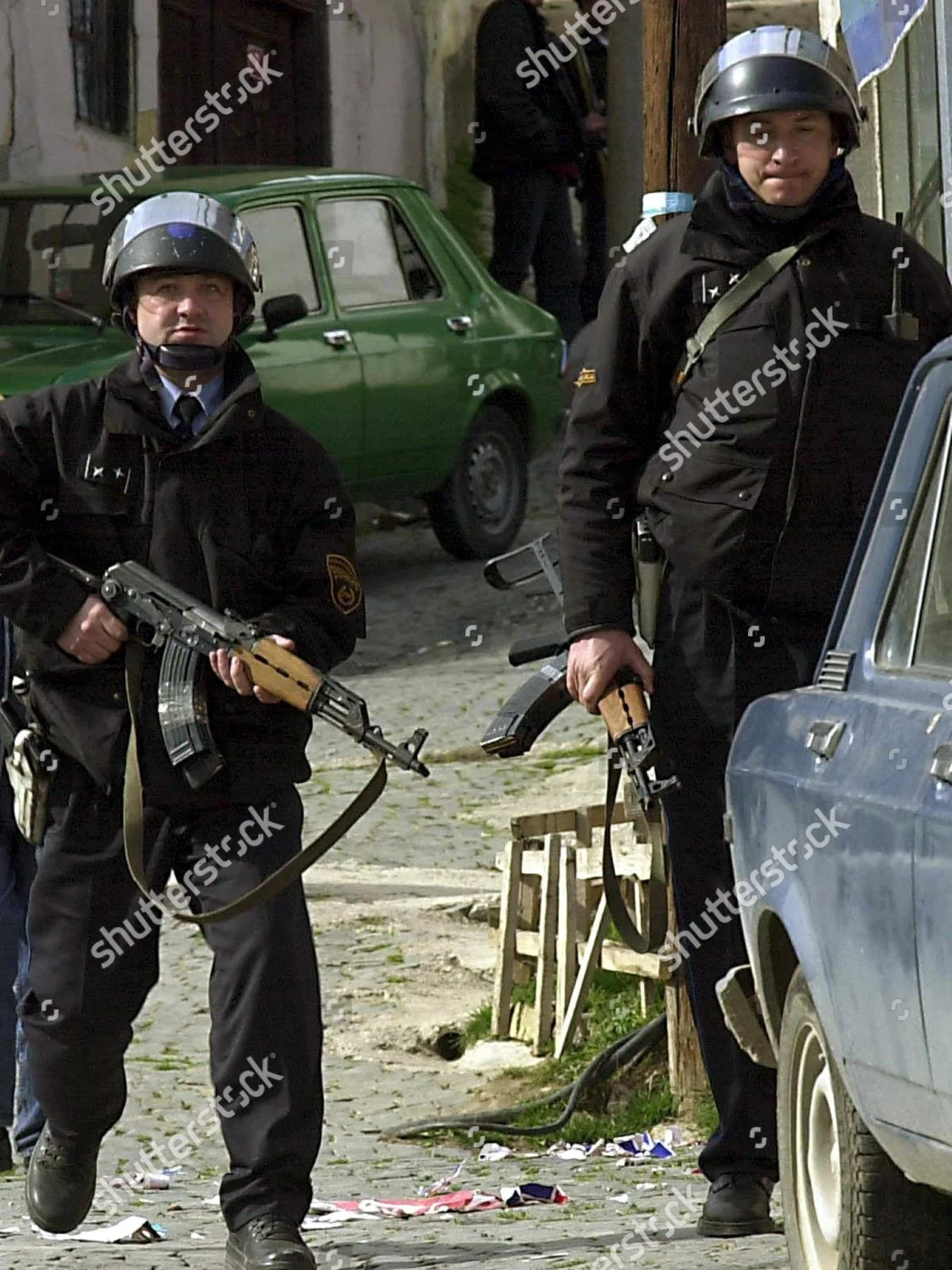 macedonia-watching-police-mar-2001-shutterstock-editorial-8482469c.webp