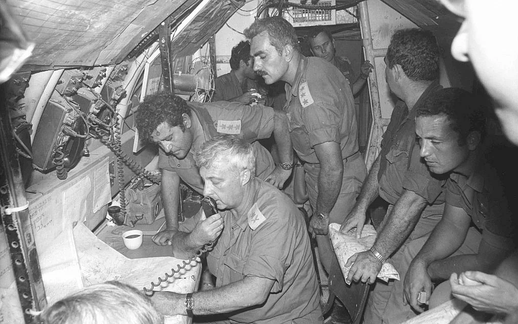 Maj. Gen. Ariel Sharon, center, meets with other senior officers in the IDF Southern Command ...webp