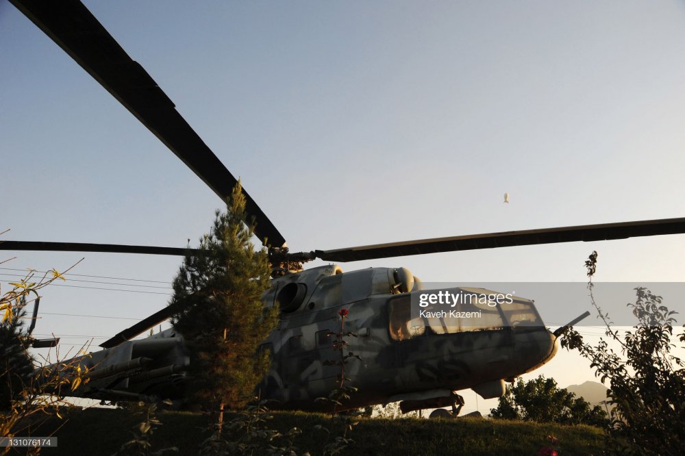 Mi-24A AAF expuesto en estacion TV Shemshad en Kabul, 16-10-2011.jpg