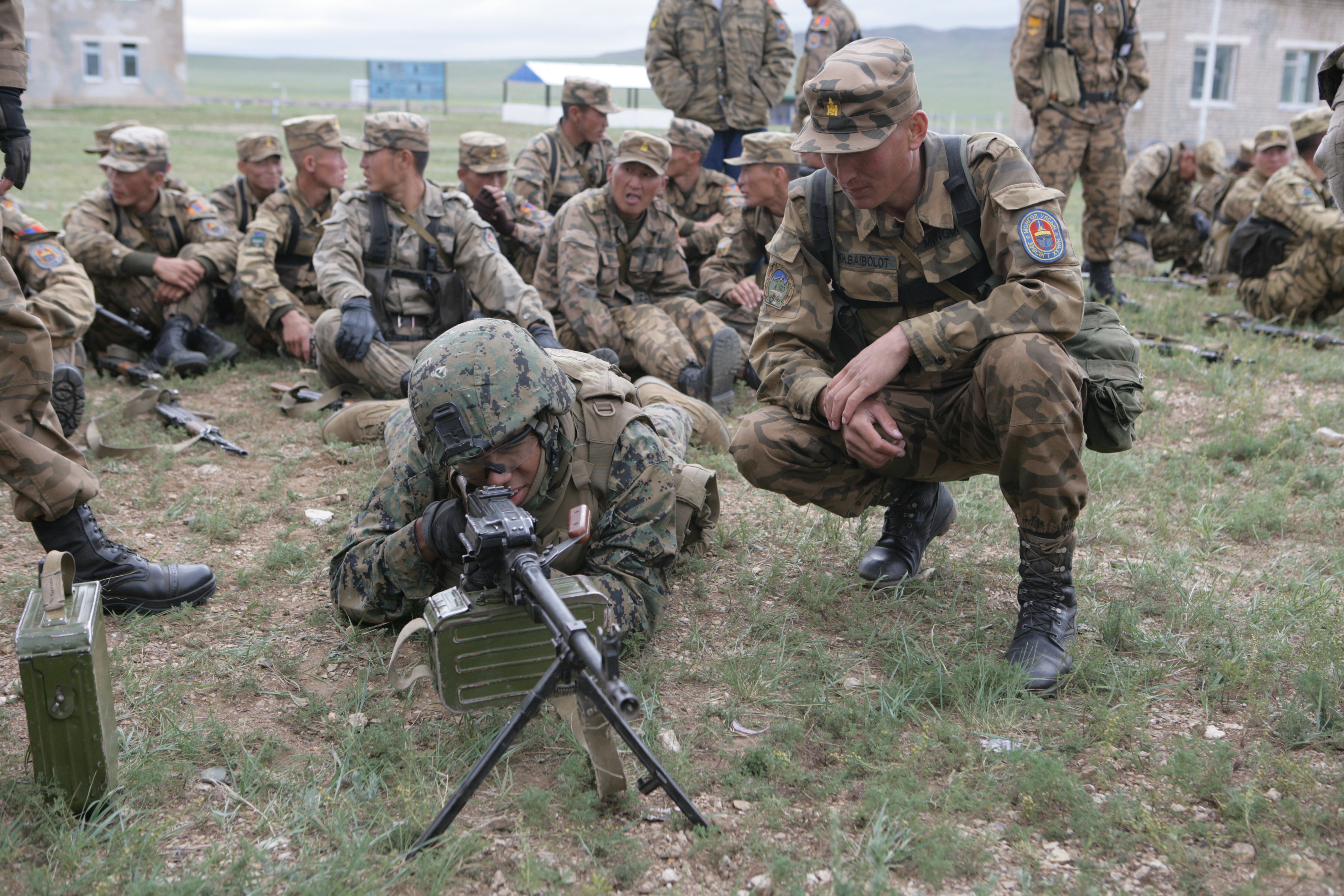 Mongolian soldier teaches U.S. Marines about an RPK machine gun.jpg
