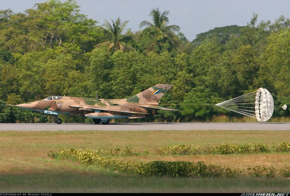 Myanmar A-5C (1503) landing at Yangon Int'l (December 2005).jpg