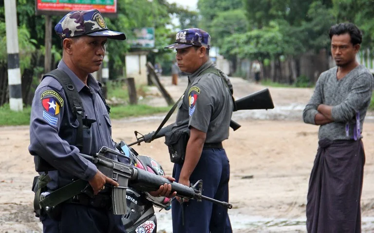 myanmar-htan-gone-police-aug-2013.webp