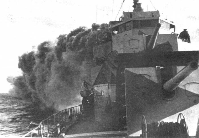 Northern fleet destroyer Gremyashchy puts a smokescreen.jpg