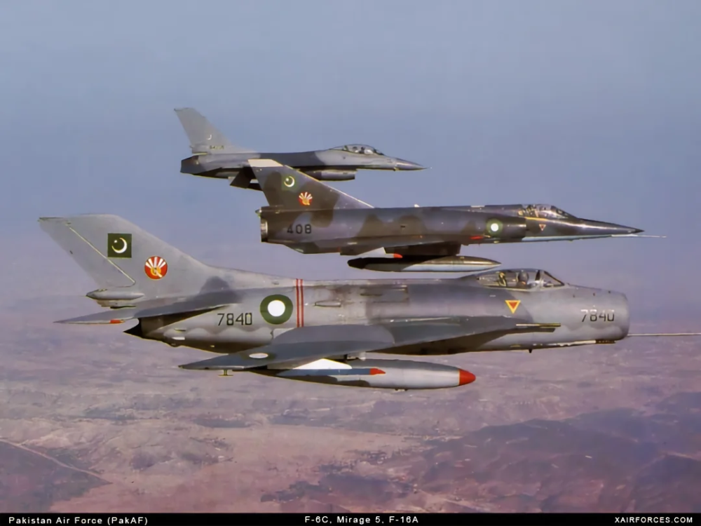 Pakistani F-6C (7840), Mirage 5 (408) & F-16A inflight.png