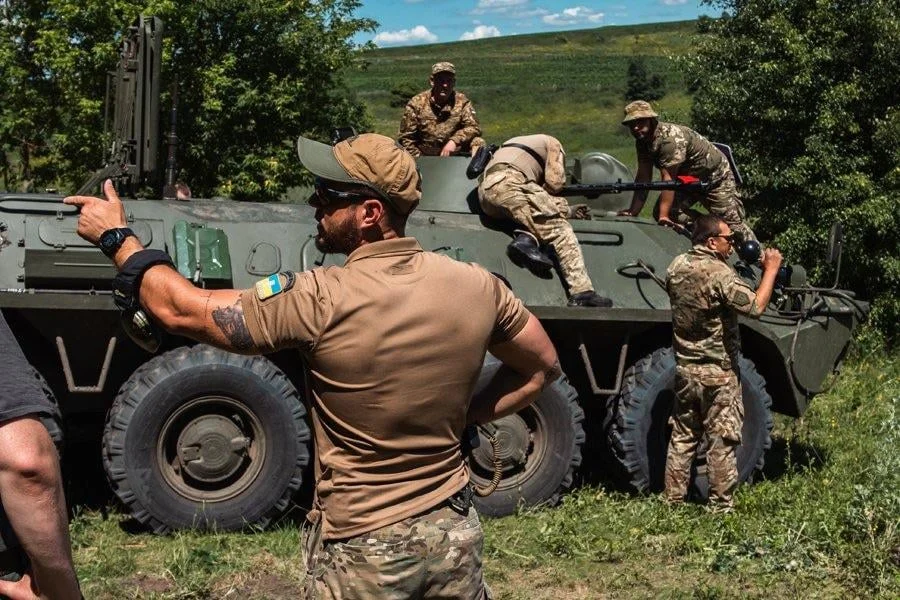 personnel-carriers-apcs-with-cage-v0-8mlg927pj0ad1.webp