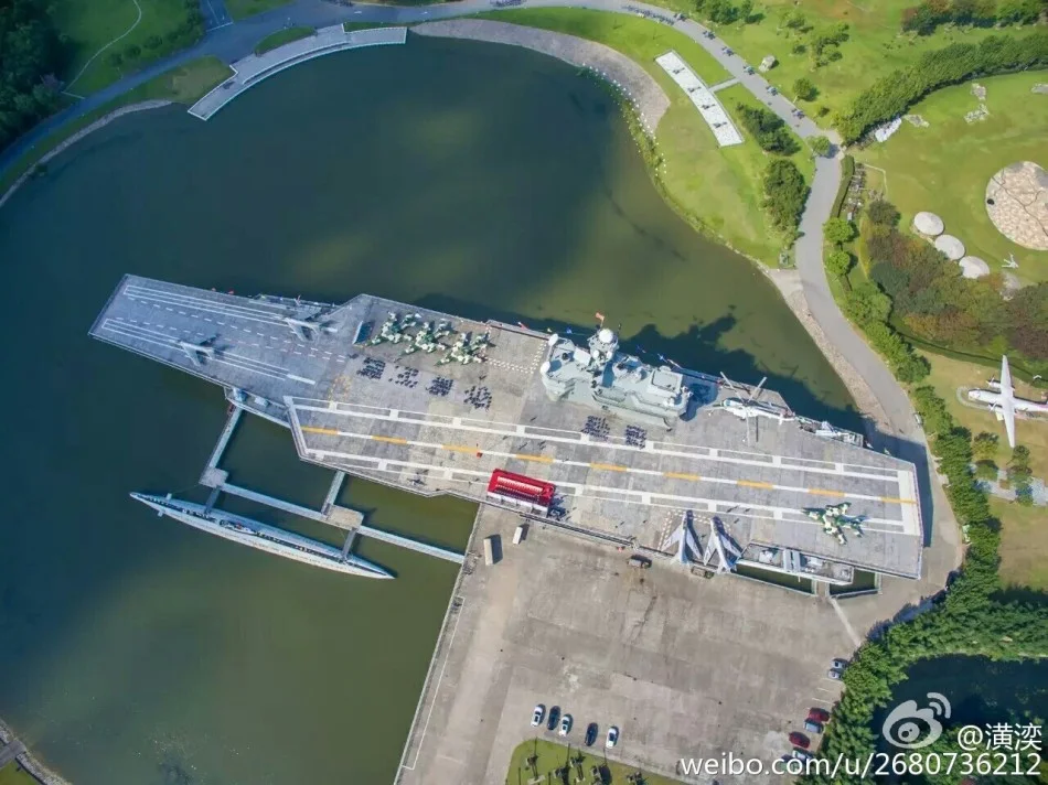 PLA Navy military training on cement aircraft carrier 1.jpg