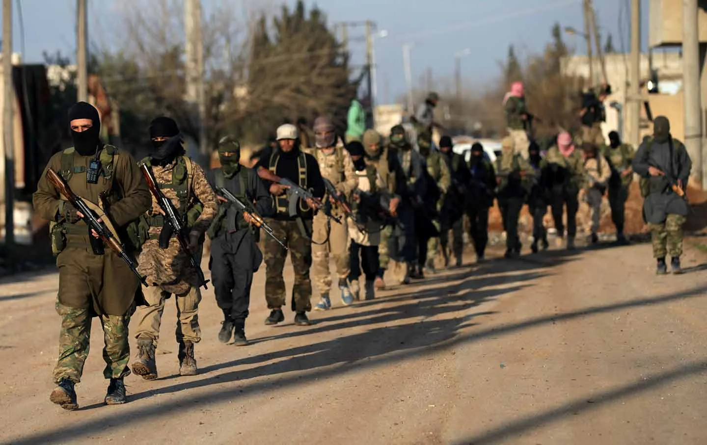 Rebels from the Ahrar al-Sharqiya group training in northern Syria.webp