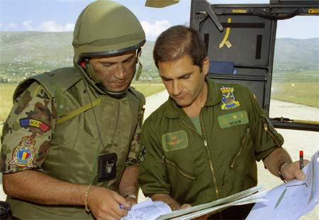 romanian capt. and spanish helicopter pilot.jpg