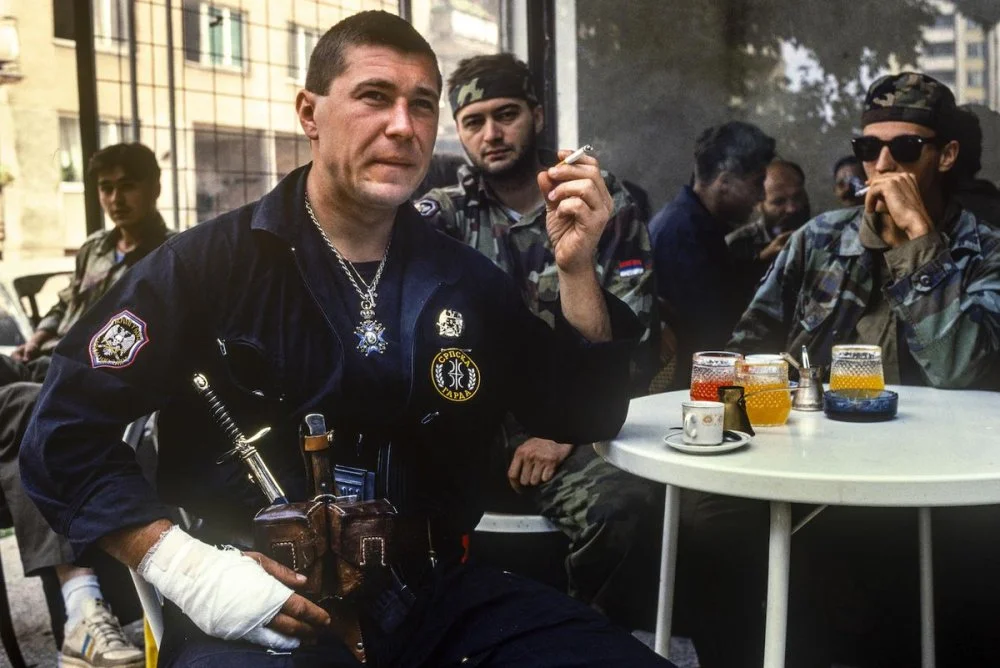 serbian guard drinking coffee.webp