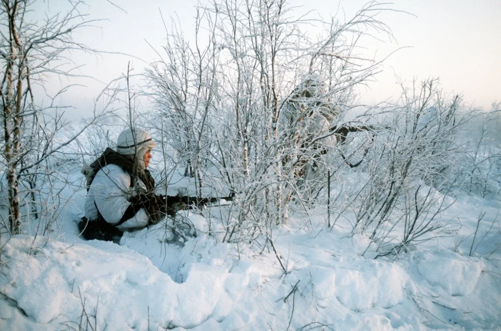 soldiers-of-the-6th-infantry-division-advance-through-the-snow-covered-underbrush-ceb8db.jpg