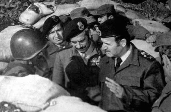 Syria’s President Hafez Assad with soldiers, 1973.jpg