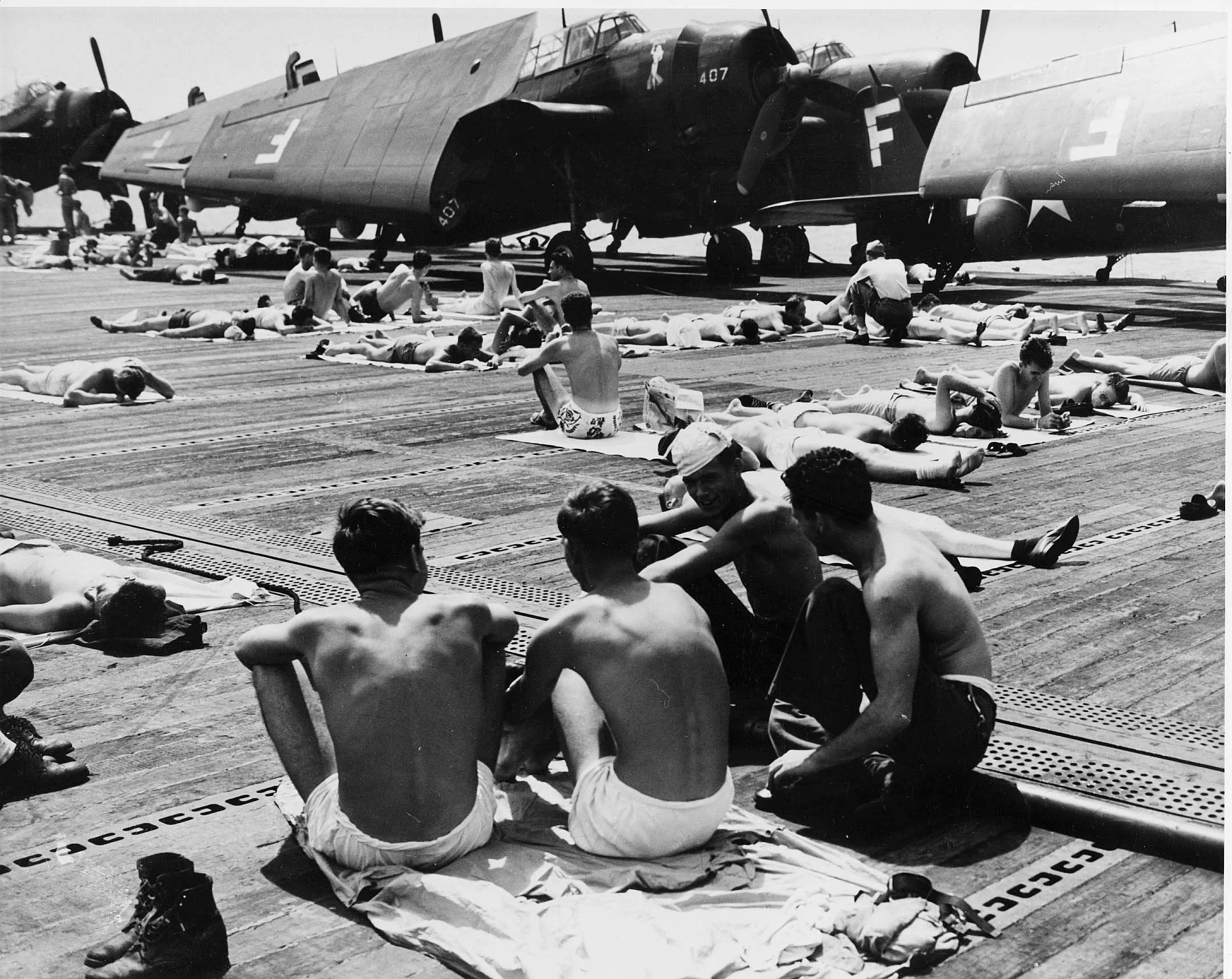 TBM Avengers, with Torpedo Squadron VT-83,  CAG-33 sitting on deck of CV-9 (USS Essex) surroun...jpg