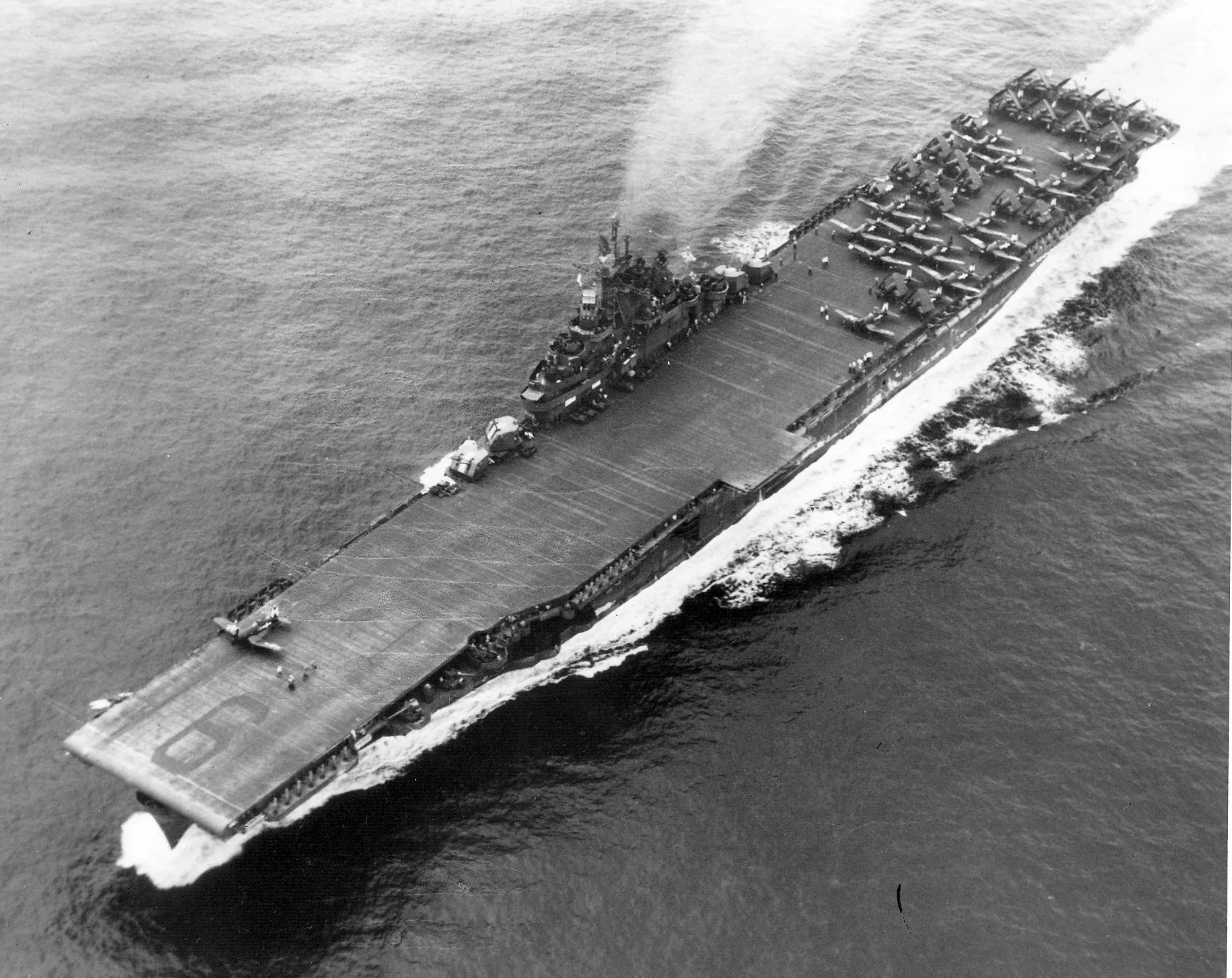 The carrier Essex (CV 9) pictured underway conducting flight operations off Okinawa. 5-20-1945.jpg