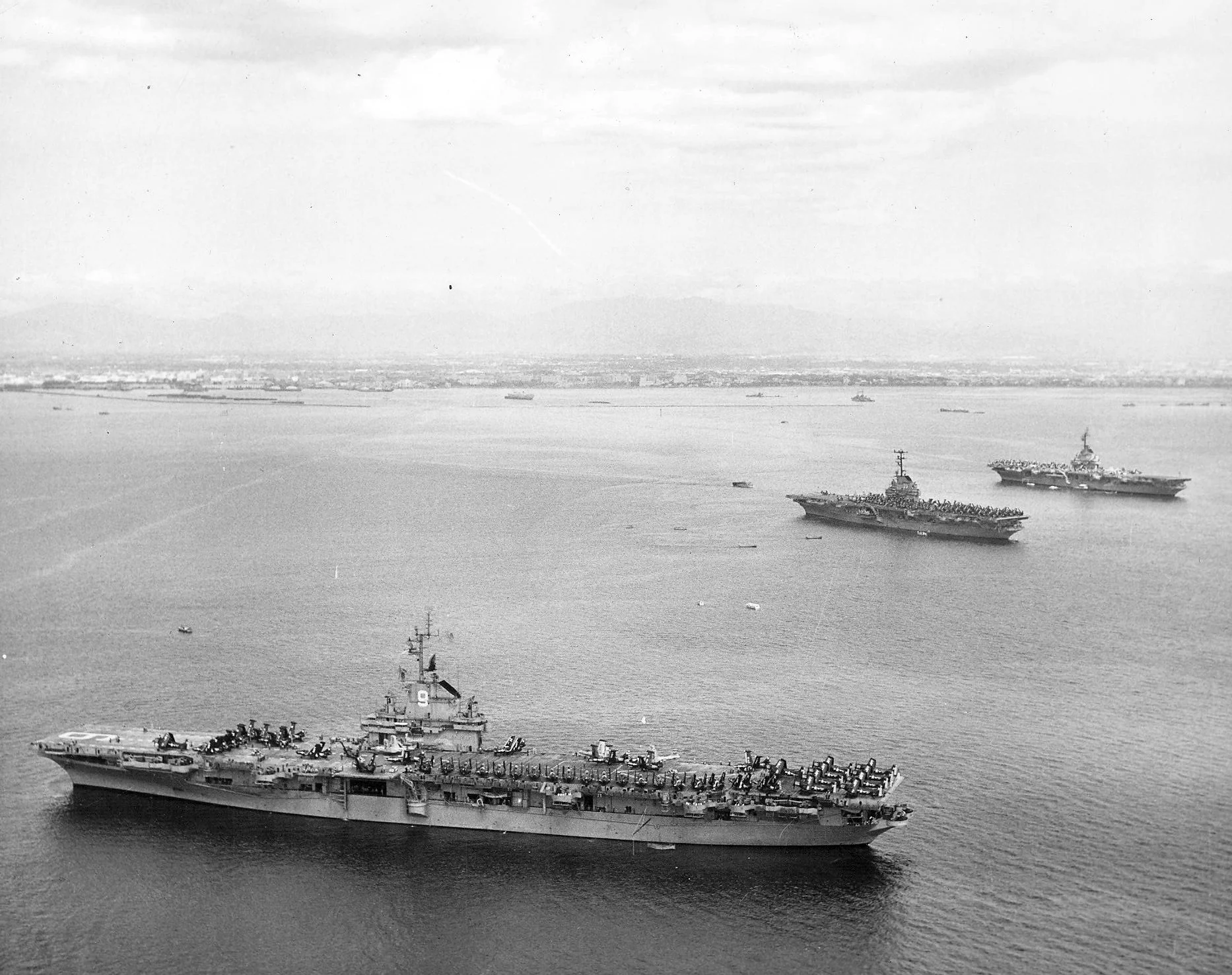 The Seventh Fleet carriers Essex CVA 9, Kearsarge CVA 33, and Yorktown CVA 10 at anchor during...jpg