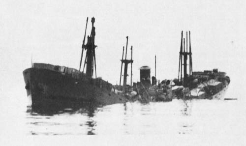 Transport Christopher Newport torpedoed, but still afloat.jpg