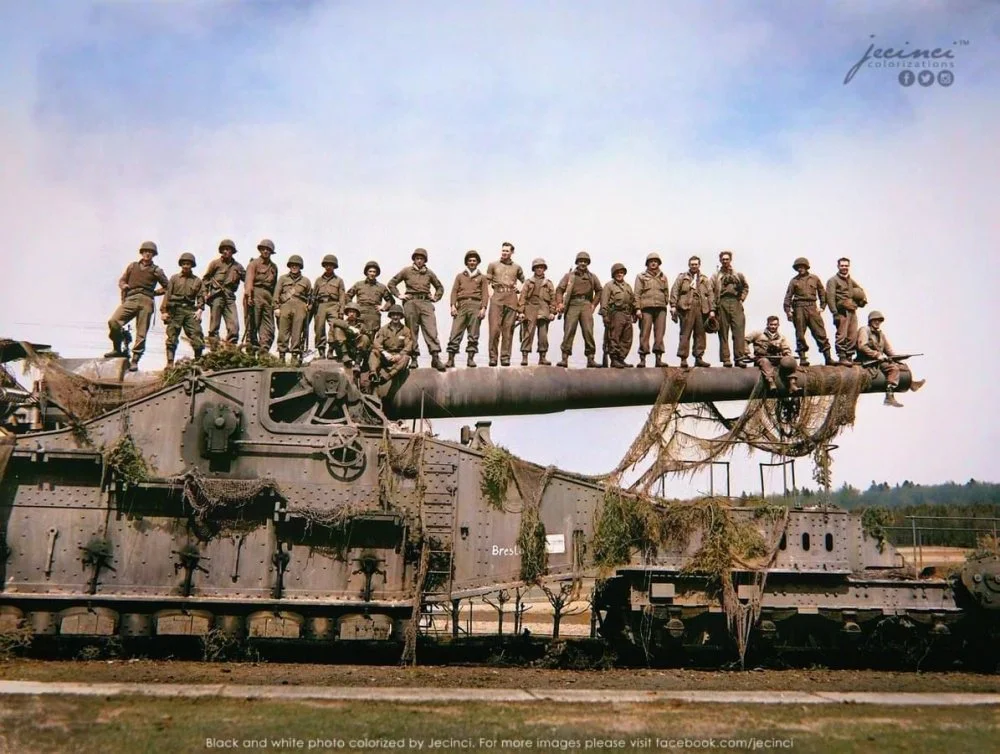 U.S. Seventh Army advance near Rentwertshausen easily holds these 22 men lined up on the barrel.webp