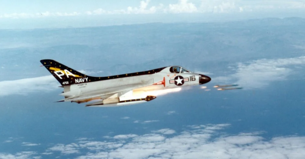 US Navy F4D -1 (4756) of VF(AW)-3 firing rockets.jpg