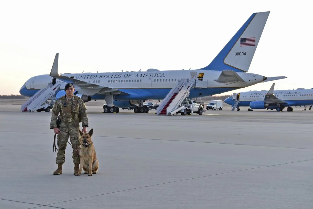 US Senior Airman Nathan White, 11th Security Support Squadron military working dog.webp