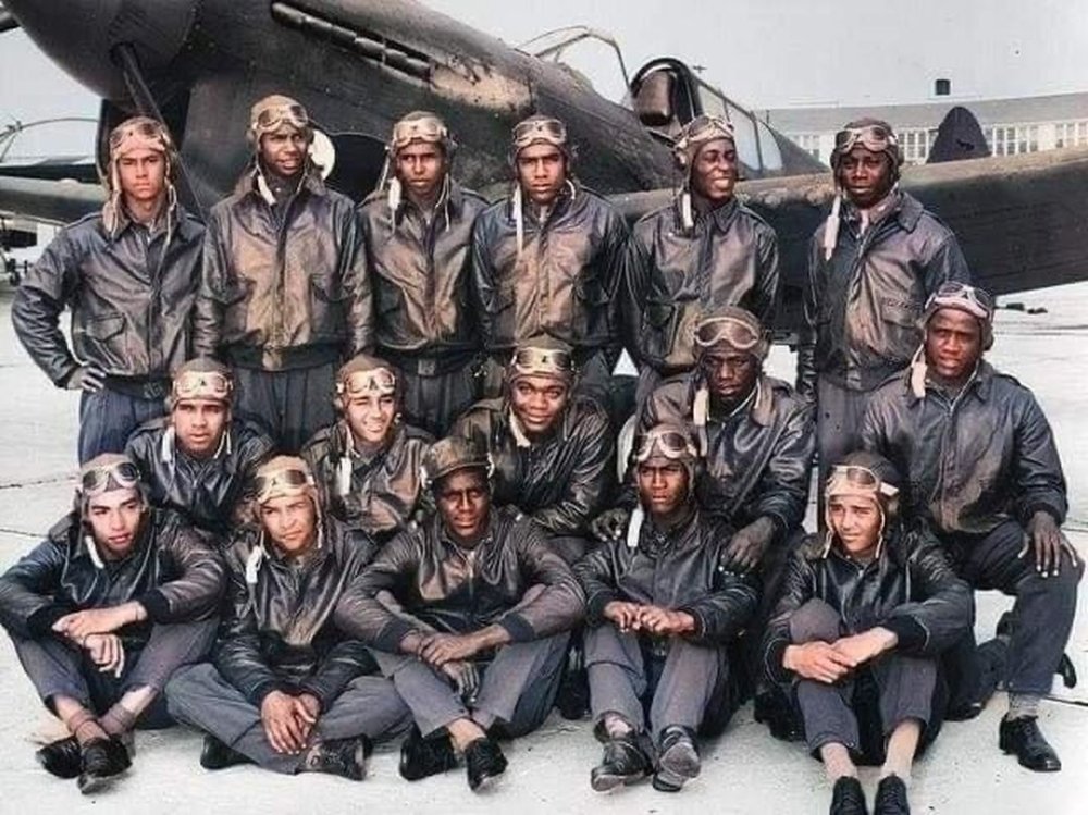 USAAF Tuskegee Airmen in front of their P-401.jpg